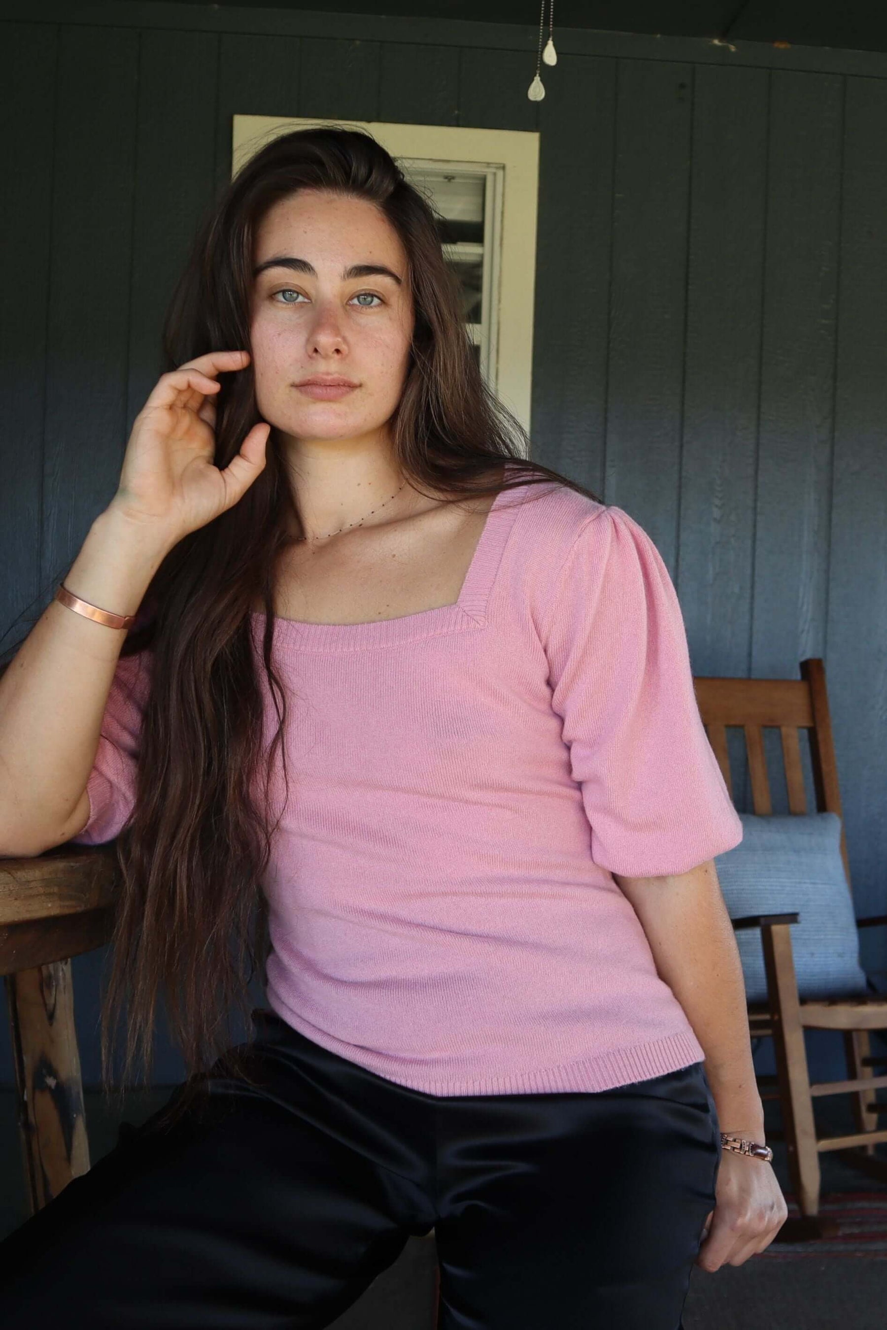 Woman wearing Pink Cashmere Sweater with Silk Bow and Short Sleeves