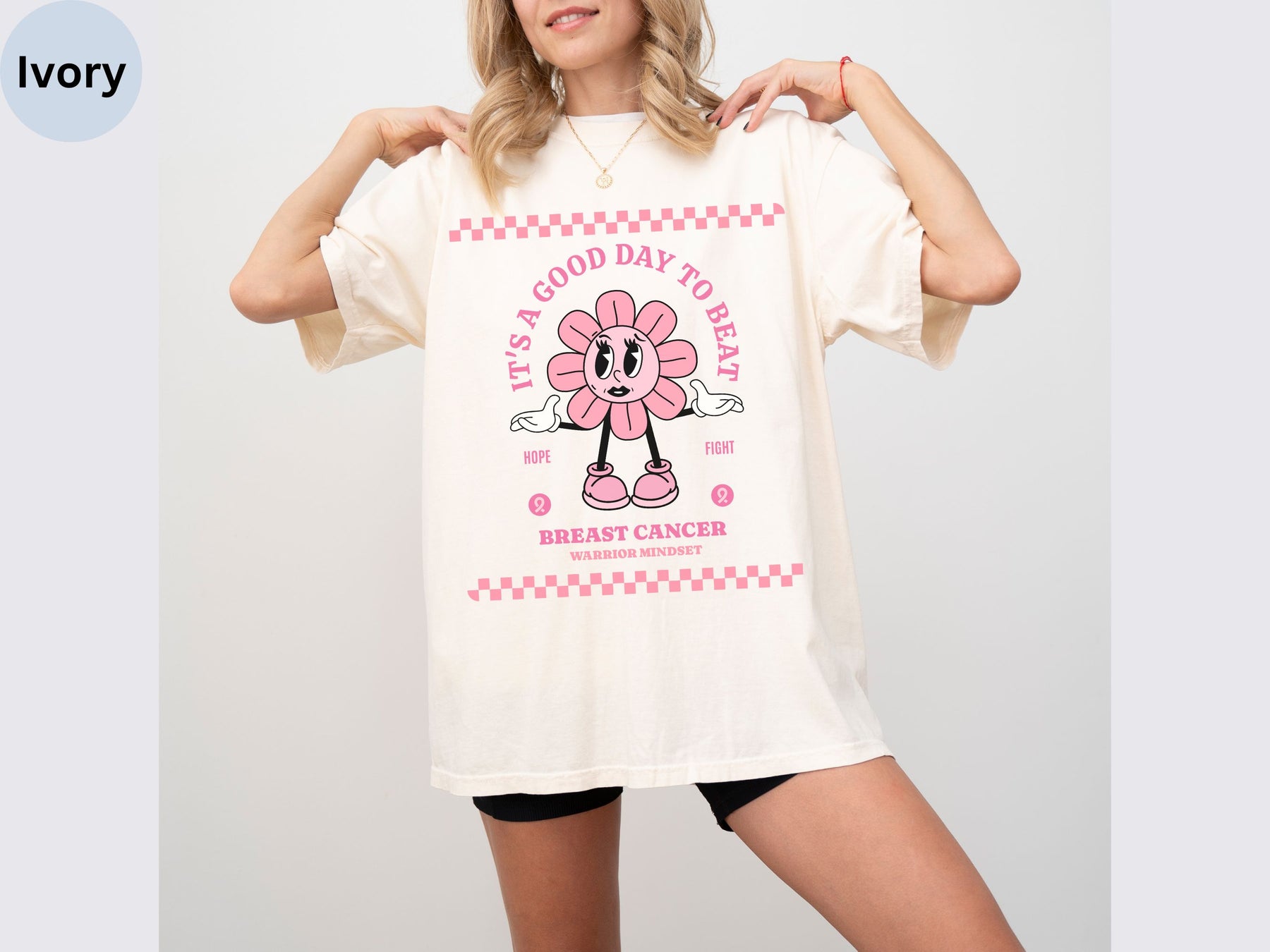 a woman wearing a t - shirt with a cartoon character on it