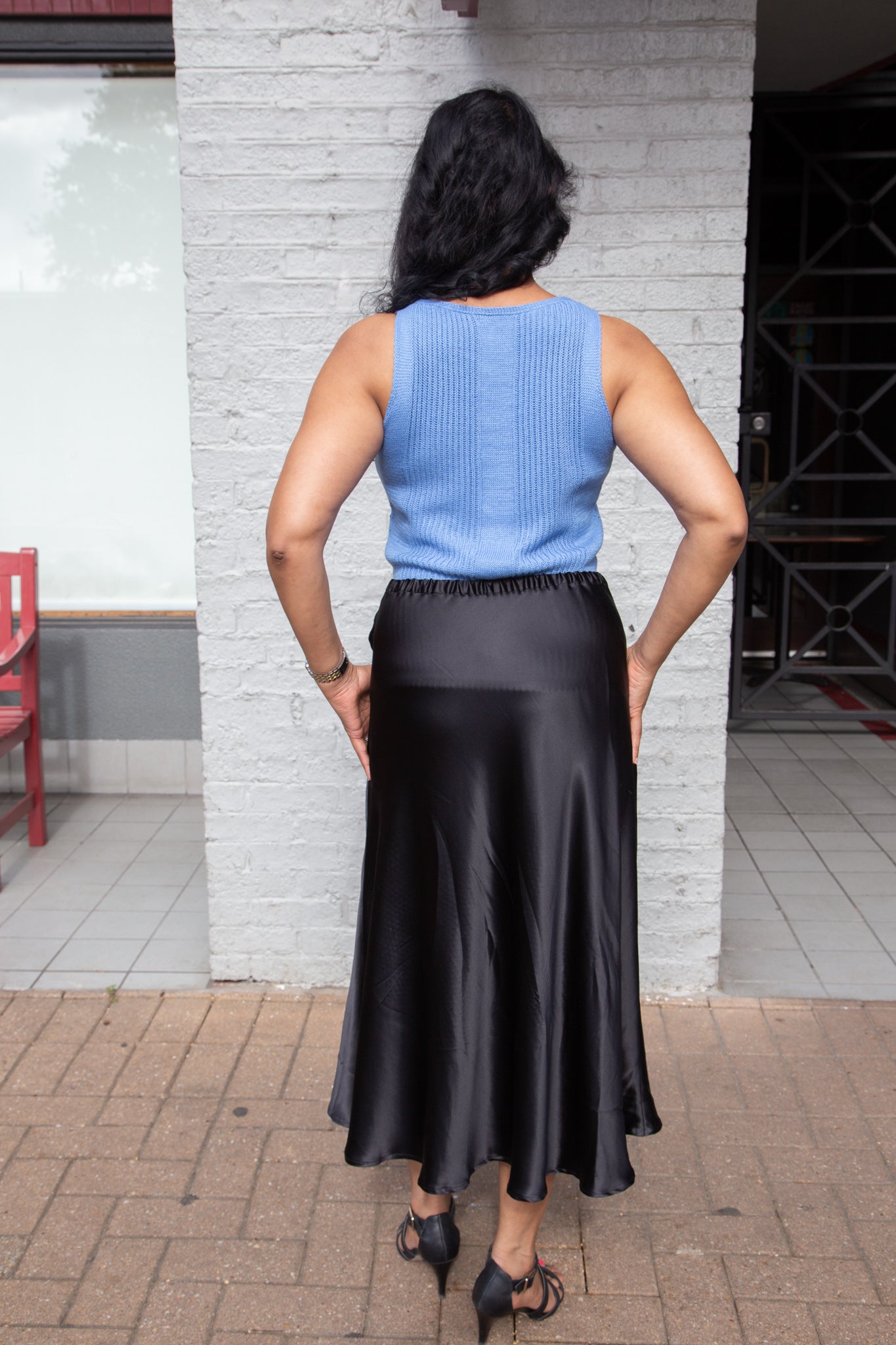 Woman's knit sweater tank made of organic cotton cashmere blend in blue back view
