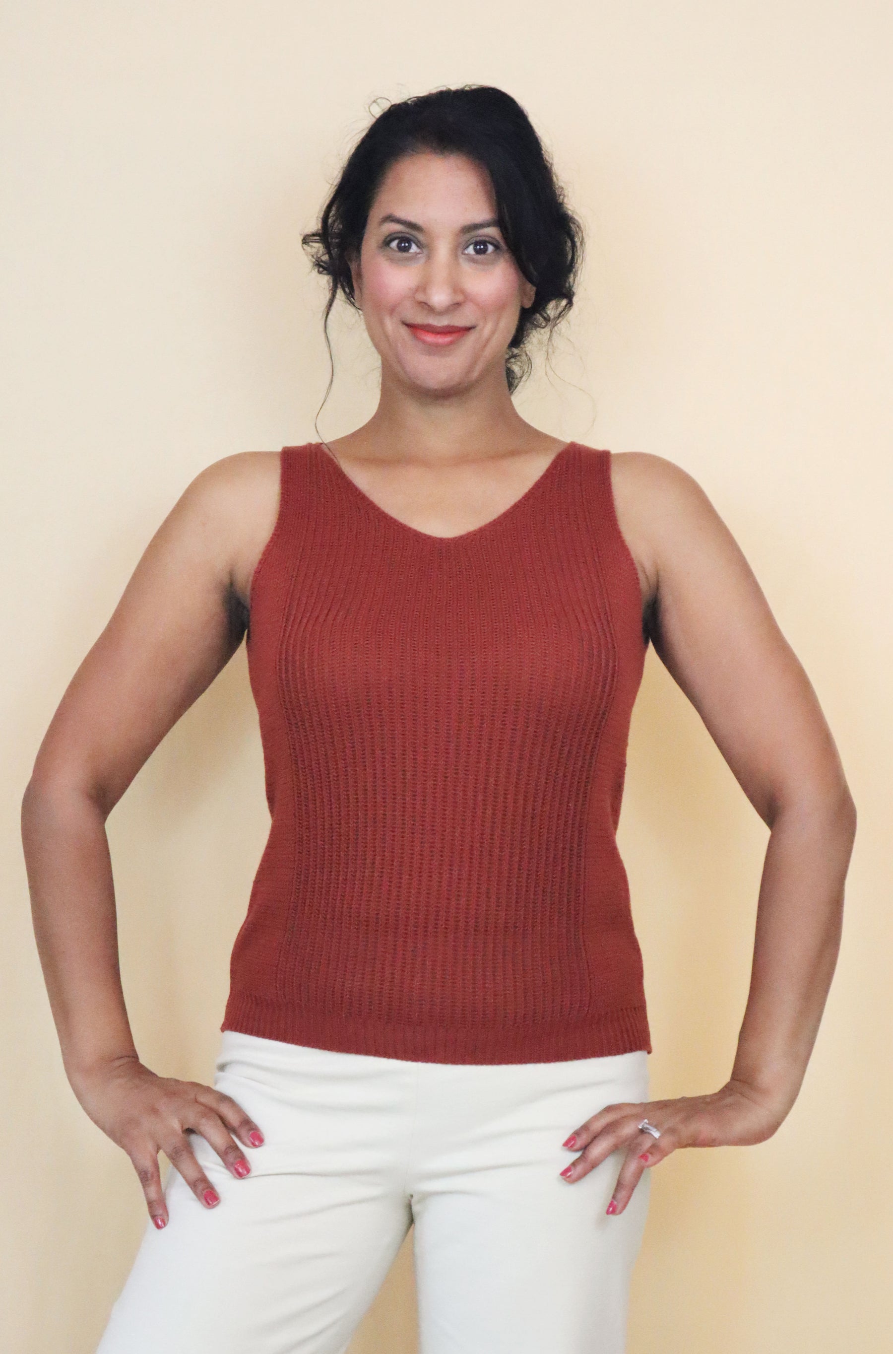 Woman's knit sweater tank made of organic cotton cashmere blend in rust cinnamon brown