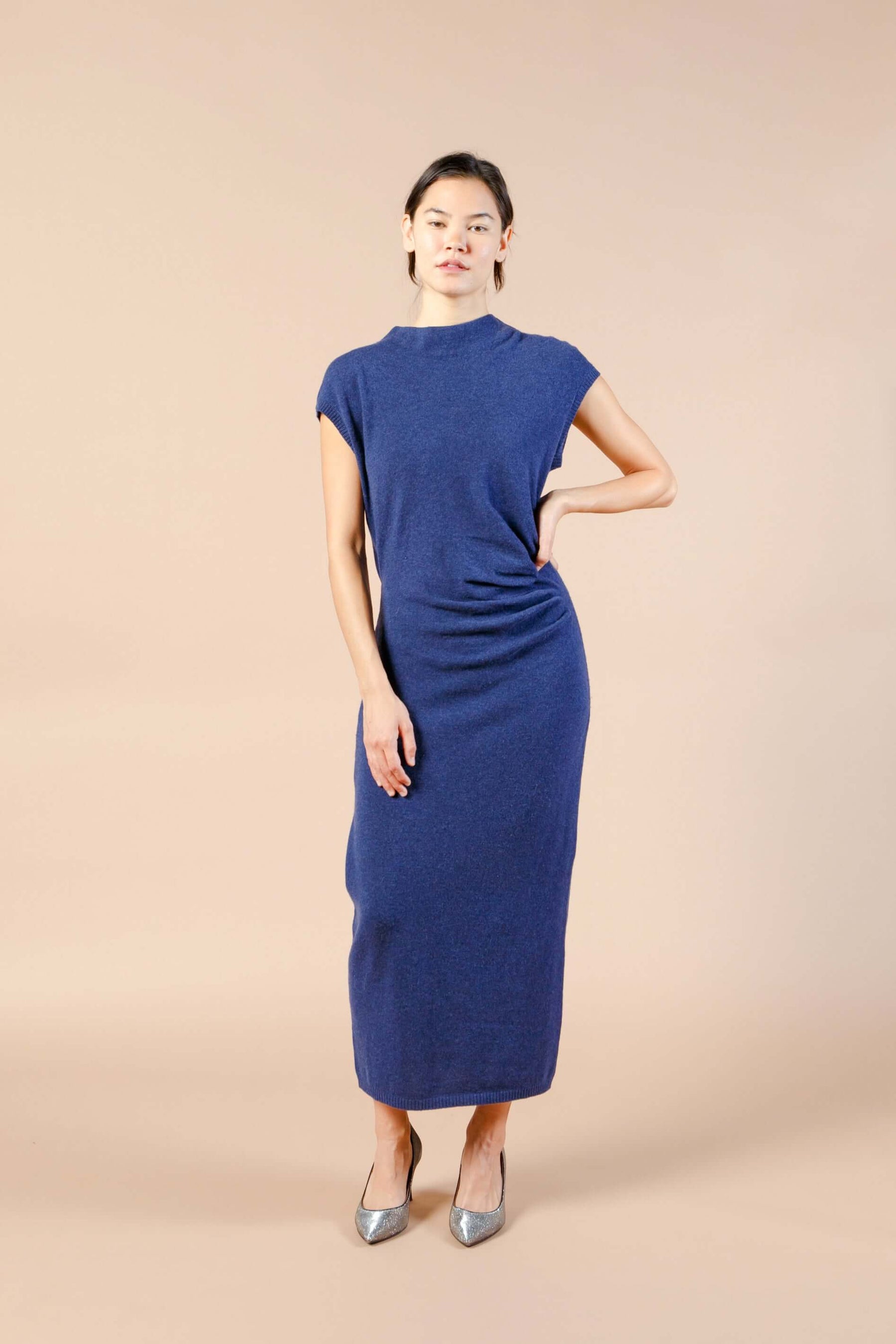 Woman wearing blue cap sleeve cashmere maxi dress