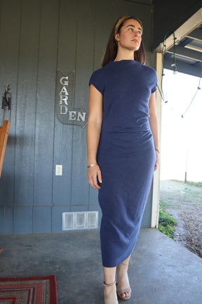 Woman wearing blue cap sleeve cashmere maxi dress