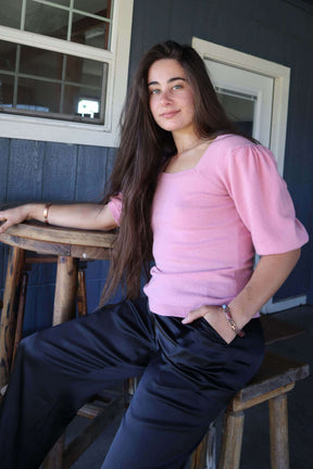 Woman wearing Pink Cashmere Sweater with Silk Bow and Short Sleeves