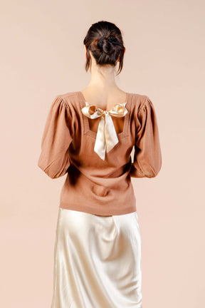 Woman wearing Brown Cashmere Sweater with Silk Bow and Short Sleeves