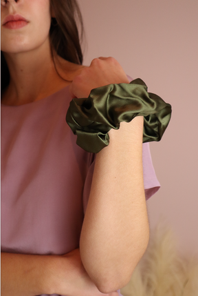 woman wearing sustainable silk scrunchies wrist